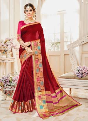 For An Attractive Royal Look, Grab This Designer Saree In Maroon Color Paired With Contrasting Fuschia Pink Colored Blouse. This Saree And Blouse Are Fabricated On Cotton Silk Which Will Give A Rich Look To Your Personality.