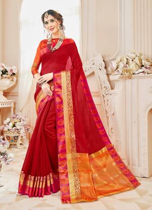 Celebrate This Festive Wearing Some Attractive Shades With This Saree In Red Color Paired With Contrasting Orange Colored Blouse. This Saree And Blouse are Fabricated On Cotton Silk Beautified With Weave. 
