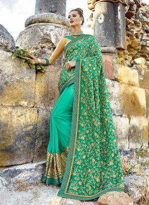Heavy Designer Saree Is Here In Sea Green Color Paired With Beige Colored Blouse. This Saree Is Fabricated On Art Silk And Georgette paired With Art Silk Fabricated Blouse. Its Pallu Has All Over Heavy Embroidered With Jari Embroidery And Stone Work.