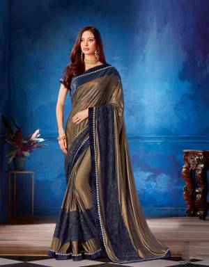 Introduce style-infused saree to your collection and own the spotlight in this shimmery golden-blue piece . 