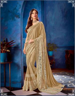All your ethnic-wear needs will be stylishly fulfilled in this sophisticated and neutral toned saree. Pair it with jazzy chandbalis to look A-class. 
