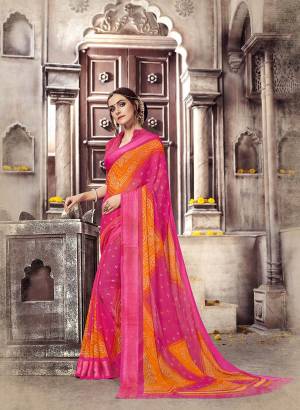 Add Some Bright Casuals With this Pretty Saree In Dark Pink And Orange Paired With Dark Pink Colored Blouse. This Saree And Blouse Are Fabricated On Georgette Beautified with Prints  All Over. Buy Now.