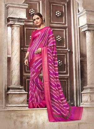 Shine Bright In This Printed Dark Pink Colored Saree Paired With Dark Pink Colored Blouse. This Saree And Blouse Are Fabricated On Georgette Beautified With Prints All Over It. Its Fabrics Ensures Superb Comfort All Day Long. Buy Now.