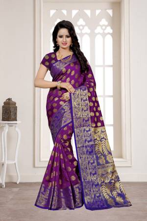 Shine Bright With This Attractive Looking Saree In Dark Purple Color Paired With Dark Purple Colored Blouse. This Saree And Blouse Are Fabricated on Banarasi Art Silk Beautified With Weave All Over. Buy This Saree Now.