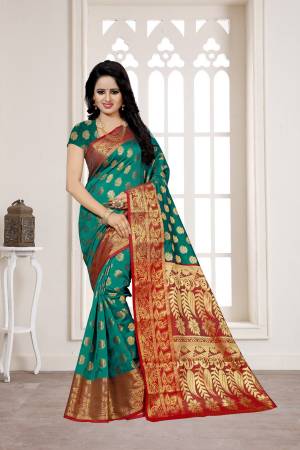Bright And Visually Appealing Color Is Here With This Banarasi Saree In Teal Green Color Paired with Teal Green Colored Blouse. This Saree And Blouse Are Fabricated On Banarasi Art Silk Beautified with Weaving All Over.