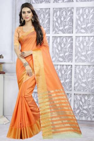 Shine Bright Wearing This Very Pretty And Elegant Looking Saree In Orange Color Paired With Orange Colored Blouse. This Saree And Blouse are Poly Cotton Based Fabric Having Plain Design. Buy Now.