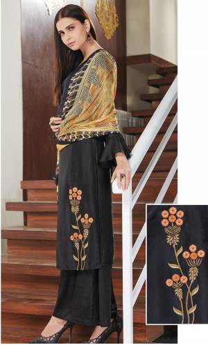 For A Bold And Beautiful Look, Grab This Designer Straight Suit In Black Colored Top And Bottom Paired With Yellow And Orange Colored Dupatta. Its Top Is Fabricated On Soft Silk Paired With Santoon Bottom And Chiffon Dupatta. It Is Beautified With Contrasting Embridery Over The Top.