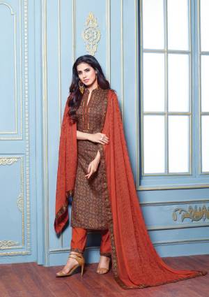 For Your Semi-Casual Wear, Grab This Beautiful Semi-Stitched Suit In Multi Colored Top Paired With Rust Orange Colored Bottom And Dupatta. Its Top And Bottom Are Fabricated On Cotton Satin Paired With Chiffon Dupatta. It Has Pretty Small Floral Prints With Embroidered Dupatta.