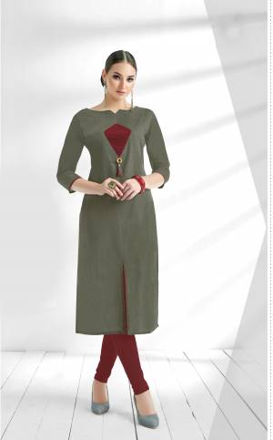 Elegant Looking Designer Readymade Kurti Is Here In Grey Color Fabricated On Cotton Slub Beautified with Front Pattern With Button. This Readymade Kurti Is Available In all Regular Sizes. Buy Now.