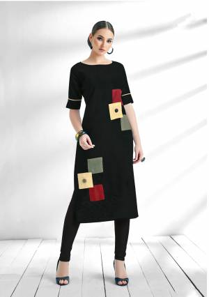 For A Bold and Beautiful Look, Grab This Designer Readymade Kurti In Black Color Fabricated On Cotton Slub Beautified With Patch Work And Buttons. This Kurti Is Available In All Regular Sizes. Buy Now.
