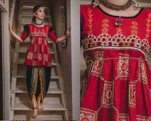 Grab This Trendy Looking Designer Kedia Set For Women In Red Colored Top Paired With Black Colored Dhoti Bottom. This Top And Bottom Are Fabricated On Khadi Beautified With Thread Work And Lace Border.