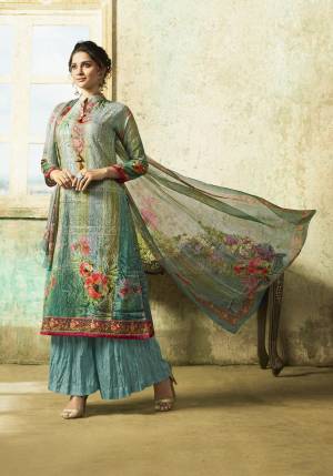 Go Colorful With This Pretty Semi-Stitched Straight Suit In Multi Colored Top Paired With Blue Colored Bottom And Multi Colored Dupatta. Its Top And Bottom Are Fabricated On Cambric Cotton Paired With Chiffon Dupatta. Buy Now.