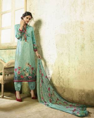 Rich And Elegant Looking Designer Straight Suit Is Here In Sea Green Colored Top Paired With Sea Green Colored Bottom And Dupatta. Its Top And Bottom Are Fabricated On Cambric Cotton Paired With Chiffon Dupatta. All Its Fabric Ensures Superb Comfort All Day Long.