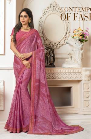 Look Pretty Wearing This Saree In Pink Color Paired With Pink Colored Blouse. This Saree Is Fabricated On Georgette Chiffon Paired With Art Silk Fabricated Blouse. It Is Beautified With Prints And Stone Work. Buy This Saree Now.