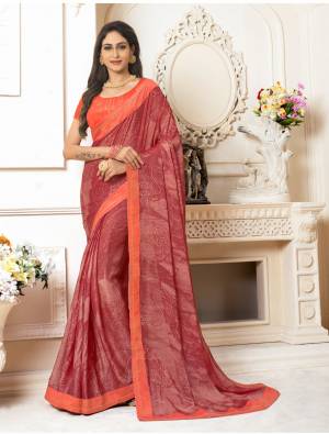 Attract All Wearing This Pretty Designer Saree In Dark Peach Color Paired With Contrasting Orange Colored Blouse. This Saree Is Fabricated On Georgette Chiffon Paired With Art Silk Fabricated Blouse. Also It Ensures Superb Comfort All Day Long.