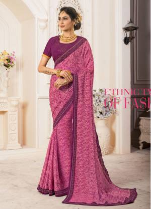 Here Is A Very Pretty Looking Saree In Pink Color Paired With Contrasting Purple Colored Blouse. This Saree Is Fabricated On Georgette Chiffon Paired With Art Silk Fabricated Blouse. It Has Stone Work Over The Blouse And Saree Lace Border.