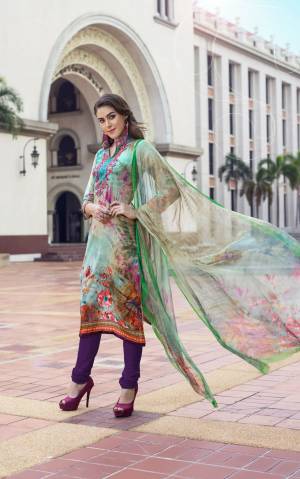 Go Colorful With This Semi-Stitched Straight Suit In Multi Colored Top And Dupatta Paired With Purple Colored Bottom. Its Top Is Fabricated On Cotton Satin Paired With Santoon Bottom And Chiffon Dupatta. It Is Beautified With Prints And Thread Work. 