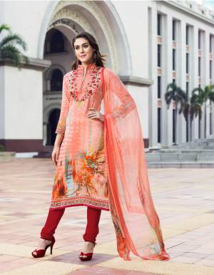 A Must Have Shade To Add Into Your Wardrobe Is Here In Light Peach Colored Top And Dupatta Paired With Red Colored Bottom. Its Top Is Fabricated On Cotton Satin Paired With Santoon Bottom And Chiffon Dupatta. All Its Fabrics Ensures Superb Comfort All Day Long. Buy Now.
