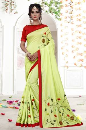 Look Beautiful Wearing This Light Green Colored Designer Saree Paired With Contrasting Red Colored Blouse. This Saree IS Fabricated On Fancy Georgette Paired With Art Silk Fabricated Blouse. It Is Simple Thread Work Over The Saree Pallu And Saree Panel.