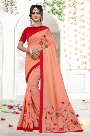 For Festive Feels, Grab This Designer Saree In Peach Color Paired With Contrasting Red Colored Blouse. This Saree Is Fabricated On Fancy Georgette Paired With Art Silk Fabricated Blouse. This Saree Is Light Weight And Easy To Drape.