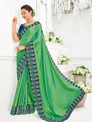 Presenting this green color two tone silk saree. Ideal for party, festive & social gatherings. this gorgeous saree featuring a beautiful mix of designs. Its attractive color and designer heavy embroidered design, Flower patch design, moti design, beautiful floral design work over the attire & contrast hemline adds to the look. Comes along with a contrast unstitched blouse.