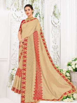 You can this amazing saree and look pretty like never before. wearing this beige color silk fabrics saree. this gorgeous saree featuring a beautiful mix of designs. look gorgeous at an upcoming any occasion wearing the saree. Its attractive color and designer heavy embroidered design, Flower patch design, moti design, beautiful floral design work over the attire & contrast hemline adds to the look. Comes along with a contrast unstitched blouse.