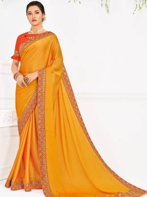 Flaunt a new ethnic look wearing this Yellow color two tone silk georgette saree. Ideal for party, festive & social gatherings. this gorgeous saree featuring a beautiful mix of designs. Its attractive color and designer heavy embroidered design, Flower patch design, moti design, beautiful floral design work over the attire & contrast hemline adds to the look. Comes along with a contrast unstitched blouse.