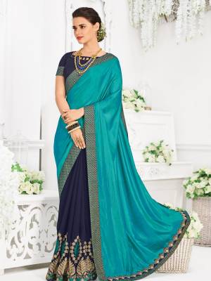 Impress everyone with your amazing Trendy look by draping this Blue & Navy Blue color silk and georgette saree. this party wear saree won't fail to impress everyone around you. this gorgeous saree featuring a beautiful mix of designs. Its attractive color and designer heavy embroidered design, Flower patch design, moti design, beautiful floral design work over the attire & contrast hemline adds to the look. Comes along with a contrast unstitched blouse.