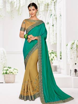 Attractively Gorgeous mesmerizing is what you will look at the next wedding gala wearing this beautiful green and beige color two tone silk and moss chiffon saree. Ideal for party, festive & social gatherings. this gorgeous saree featuring a beautiful mix of designs. Its attractive color and designer heavy embroidered design, Flower patch design, moti design, beautiful floral design work over the attire & contrast hemline adds to the look. Comes along with a contrast unstitched blouse.