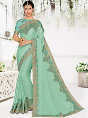 You Look elegant and stylish this festive season by draping this Baby Blue color bright georgette saree. Ideal for party, festive & social gatherings. this gorgeous saree featuring a beautiful mix of designs. Its attractive color and designer heavy embroidered design, Flower patch design, moti design, beautiful floral design work over the attire & contrast hemline adds to the look. Comes along with a contrast unstitched blouse.
