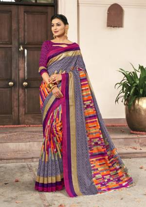 You Will Earn Lots Of Compliments Wearing This Silk Based Saree In Grey And Multi Color Paired With Purple Colored Blouse. Its Fabric And Color Gives A Rich Look To Your Personality.