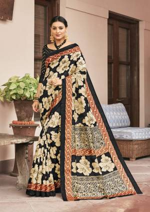 For A Bold And Beautiful Look, Grab This Silk Based Saree In Black And Cream Color Paired With Black Colored Blouse. Its Fabric Is Soft Towards Skin And Easy To Carry All Day Long.