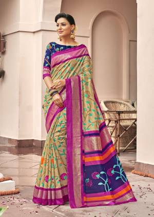 Flaunt Your Rich And Elegant Taste Wearing This Saree In Beige And Pink Color Paired With Contrasting Navy Blue Colored Blouse. This Saree And Blouse are Art Silk Based Fabric Beautified With Prints all Over.