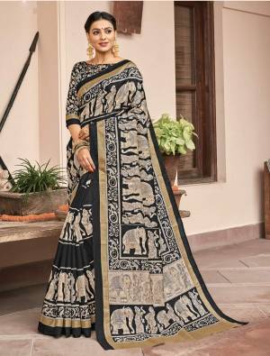 For A Bold And Beautiful Look, Grab This Silk Based Saree In Black And Cream Color Paired With Black And Cream Colored Blouse. Its Fabric Is Soft Towards Skin And Easy To Carry All Day Long.