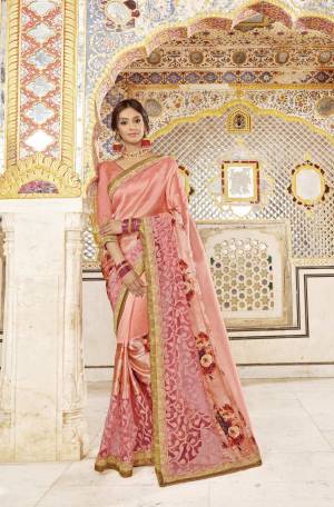 Look Pretty Wearing this Designer Saree In Peach Color Paired With Peach Colored Blouse. This Saree Is Fabricated On Fancy Silk Paired With Art Silk Fabricated Blouse. This Saree Is Beautified With Floral Prints And Embroidery.Buy Now.