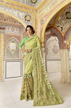 Look Pretty Wearing this Designer Saree In Light Green Color Paired With Light Green Colored Blouse. This Saree Is Fabricated On Fancy Silk Paired With Art Silk Fabricated Blouse. This Saree Is Beautified With Floral Prints And Embroidery.Buy Now.