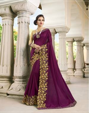 Attract All Wearing This Attractive Designer Saree In Wine Color Paired With Golden Colored Blouse. This Saree Is Fabricated On Art Silk Paired With Art Silk Fabricated Blouse.