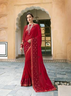 Adorn The Pretty Angelic Look Wearing This Designer Saree In Red Color Paired With Red Colored Blouse. This Saree Is Fabricated On Silk Georgette Paired With Art silk Fabricated Blouse.