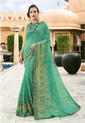 Celebrate This Festive Season Wearing This Designer Saree In Sea Green Color Paired With Sea Green Colored Blouse. This Saree Is Fabricated On Chiffon Paired With Art Silk Fabricated Blouse. It Is Beautified With Attractive Embroidery Over The Lace Border.