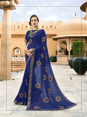 Look Attractive In This Beautiful Royal Blue Colored Saree Paired With Royal Blue Colored Blouse. This Saree IS Fabricated On Georgette Paired With Art Silk Fabricated Blouse. Both Its Fabrics Ensures Superb Comfort All Day Long. Buy Now.