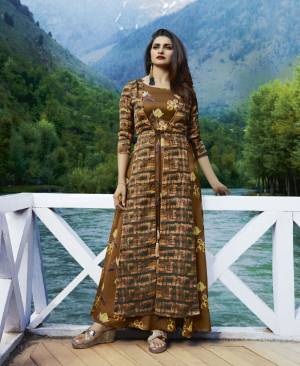 Rich And Elegant Looking Designer Readymade Kurti Cum Gown Is Here In Lovely Brown Shade. It Is Fabricated On Satin And Crepe Beautified With Prints.  Buy Now.