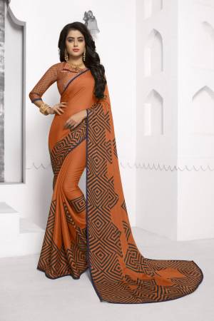 Grab This Pretty Saree For This Festive Season Which Ensures Beauty And Comfort. This Saree Is In Light Orange Color Fabricated On Chiffon Which IS Light Weight And Easy To Drape. Buy Now.