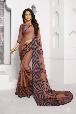 You Will Definitely Earn Lots Of Compliments Wearing This Pretty Printed Saree In Dusty Pink Color Paired With Dusty Pink Colored Blouse. This Saree And Blouse Are Fabricated On Chiffon. This Saree Is Light Weight And easy to Drape Which Is Easy to Carry All Day Long.