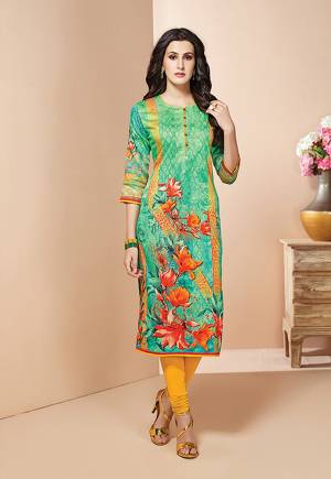 Be It Your College, Home Or Your Work Place, This Kurti IS Suitable For All. Grab This Readymade Kurti In Green Color Fabricated On Cotton Beautified With Prints All Over.