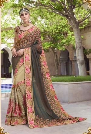 Elegant And Rich Looking Heavy Designer Saree Is Here In Brown And Beige Color Paired With Brown Colored Blouse. This Saree Is Fabricated On Art Silk and Georgette Paired With Art Silk Fabricated Blouse. It Has Heavy Contrasting Embroidery All Over. Buy Now.
