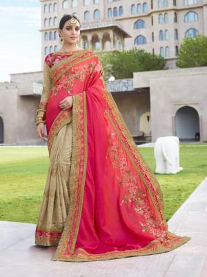 Shine Bright Wearing This Designer Saree In Dark Pink And Beige Color Paired With Dark Pink Colored Blouse. This Saree Is Fabricated On Silk And Georgette Paired With Art Silk Fabricated Blouse. Its Fabrics Ensures Superb Comfort Throughout The Gala.