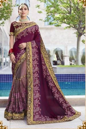New Shades Are Here To Add Into Your Wardrobe With this Designer Saree In Wine And Mauve Color Paired With Wine Colored Blouse. This Saree Is Fabricated On Silk And Silk Georgette Paired With Art Silk Fabricated Blouse. Buy Now. 