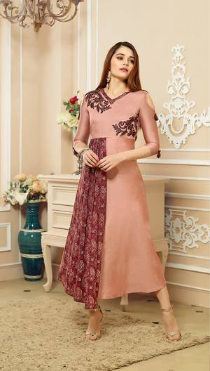 Most Demanding And A Color Must Have In Every Womens Wardrobe Is Here With This Readymade Designer Kurti In Dusty Pink Color Fabricated On Cotton. Its Pretty Color and New Pattern Will earn You Lots Of Compliments From Onlookers.