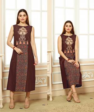 For Your Semi-Casual Wear, Grab This Designer Readymade Kurti In Brown Color Fabricated On Cotton Beautified With Prints And Thread Work. Its Rich Color And Pattern Is Suitable For Any Occasion. Buy Now.