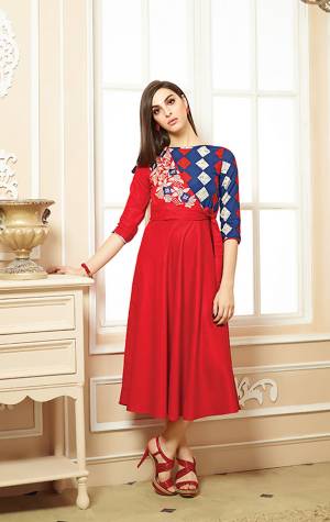 Adorn The Pretty Angelic Look, Wearing This Designer Readymade Kurti In Red Color Fabricated On Cotton Beautified With Prints And Thread Work. Buy Now.
